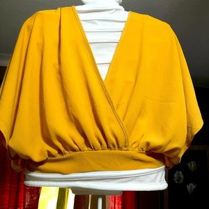 Light and flowing mustard yellow  blouse